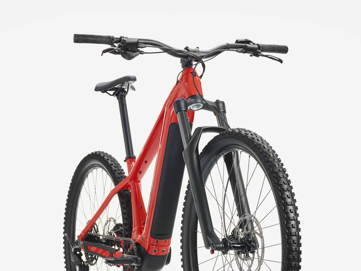 Trek Powerfly+ 4 800Wh Gen 5: front view and suspension fork, shown in Radioactive Red / Black Chrome.